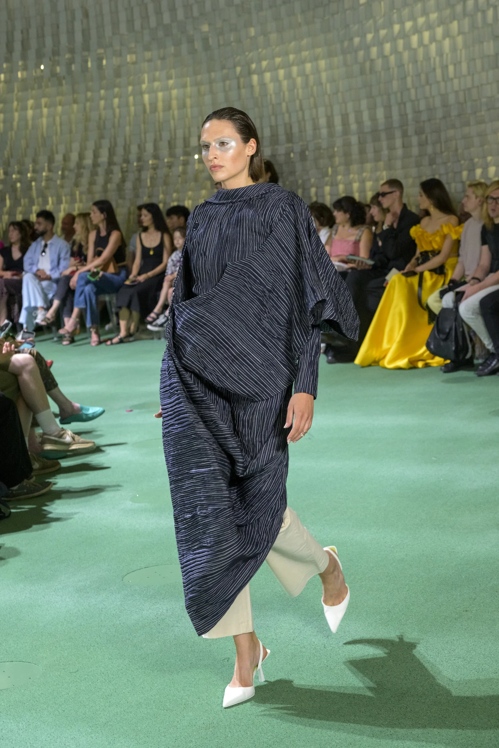 Power Pinstripe Perfection from the SUIT UP collection on the runway at Espace Niemeyer, Paris