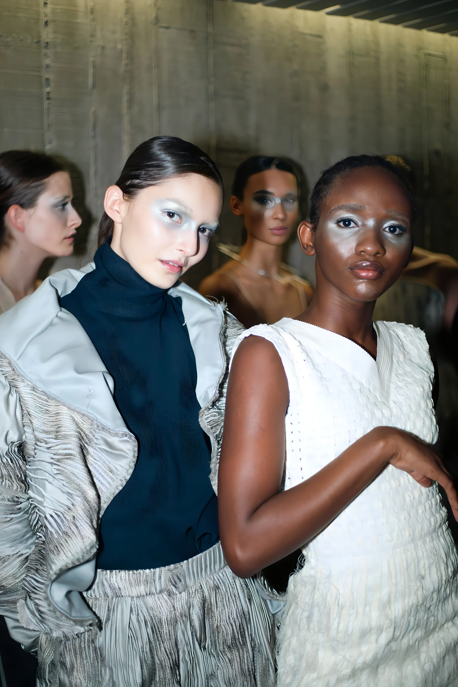 Istituto Marangoni Paris graduate show, July 2023 — backstage, two looks from the SUIT UP collection seen together before the show
