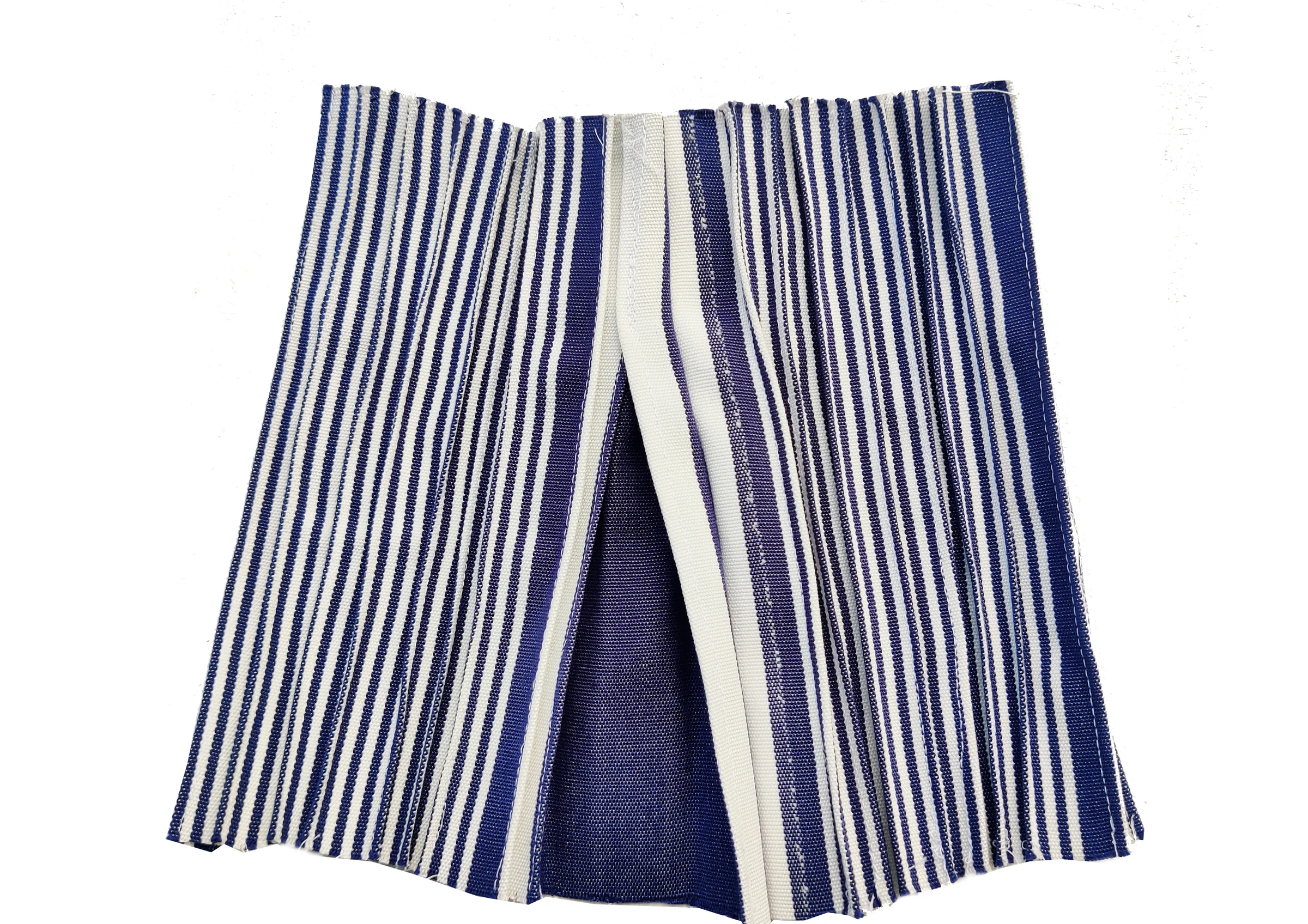 Blue and white pinstripe fabric stitched in vertical lines to create an embossed surface